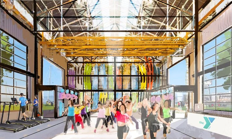 A rendering of the fitness floor inside the proposed centre, under the building's exposed steel roof structure.